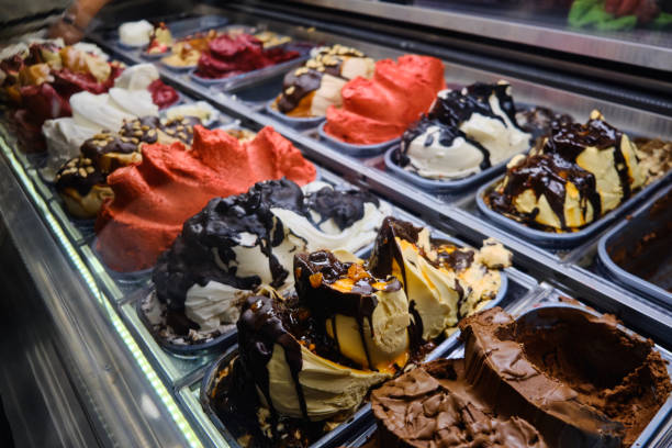 istock Lots of ice creams at showcase fridge display 1334392852