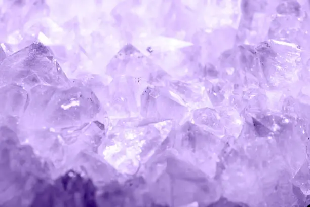 Photo of Detail of natural crystal patterns in lilac color. Abstract image with random patterns