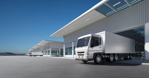 istock Freight trucks park in the warehouse 1334396484