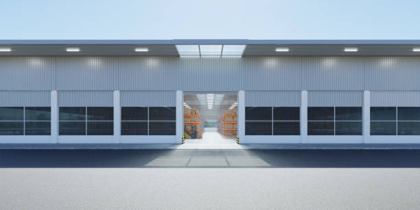 istock Modern new factory building with empty asphalt floor 1334396605