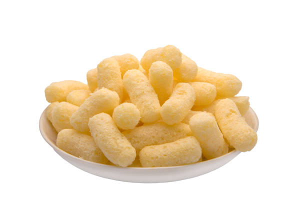 istock Corn puffs, finger food on a plate. 1334401102