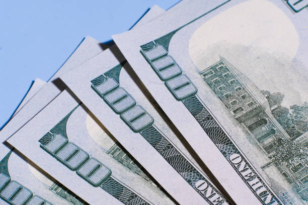 istock US dollar, macro shot. Money background 1334404425