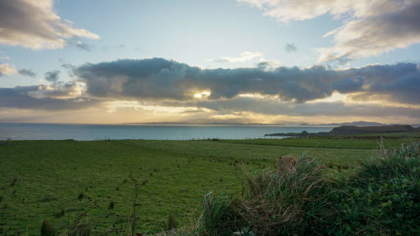 istock Landscape during cloudy sunrise in Isle of Skye. 1334405665