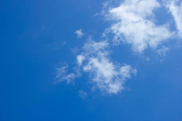istock White transparent clouds against the blue sky 1334406011