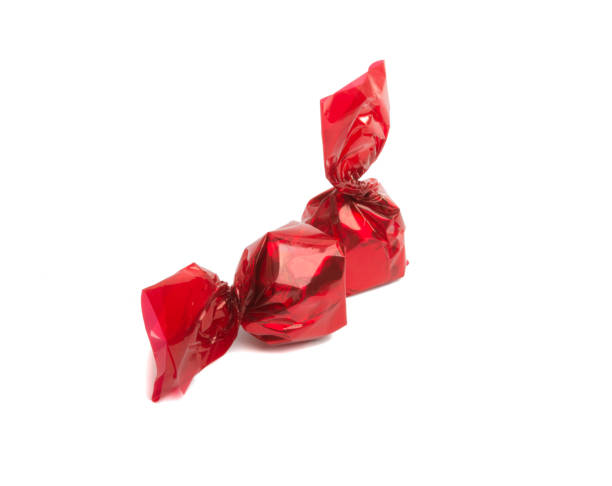istock Sweets in red foil isolated 1334407574