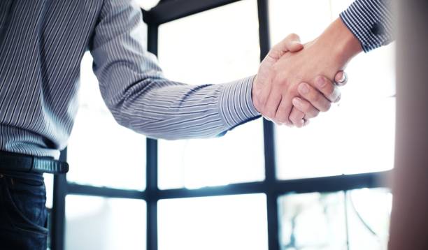 istock Image business mans handshake. Business partnership meeting concept. 1334407592