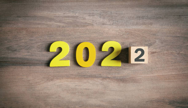 istock 2022 with cube on the table. Happy new year 1334408772
