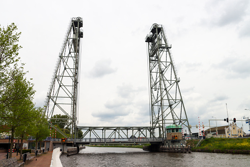 Steel vertical lift bridge over Gouwe canal in Waddinxveen the Netherlands
