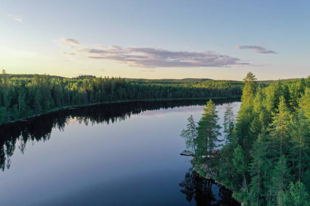 istock Finland lake nature beautiful sunset arial view 1334413360