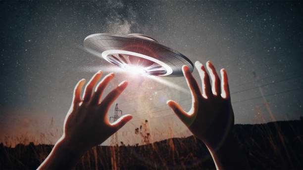 unidentified flying object - UFO flies over the forest - concept 3D illustration Kidnapping by UFO concept - contact with an alien civilization - the guy covers himself with his hands in front of an unidentified flying object 3D illustration military invasion photos stock pictures, royalty-free photos & images