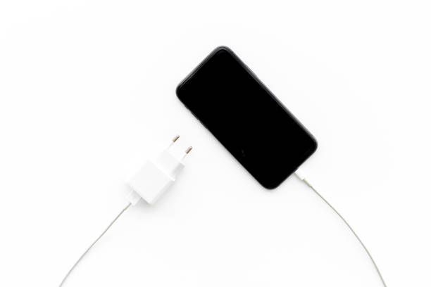 istock Charging cable for mobile phone or laptop, top view 1334418847