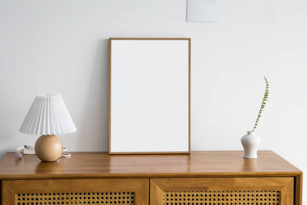 istock empty picture frames collages on wooden drawer. 1334420185