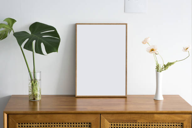 istock empty picture frames collages on wooden drawer. 1334420189