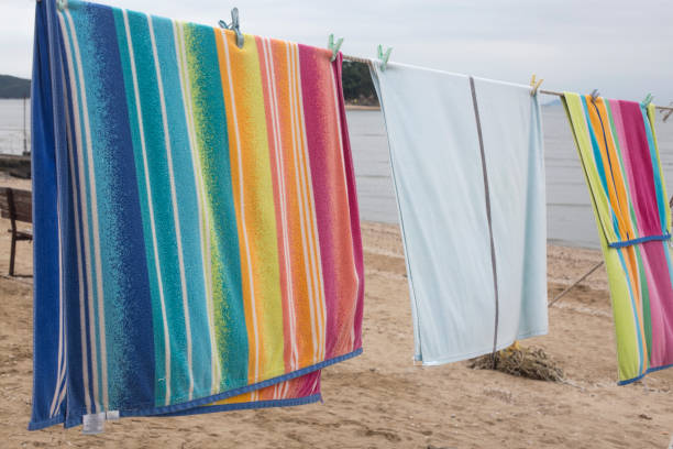 istock view of sandy beach with beach towel. 1334420210