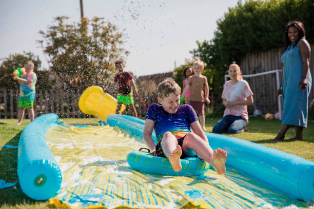 istock Slip n Slide Garden Fun 1334422112