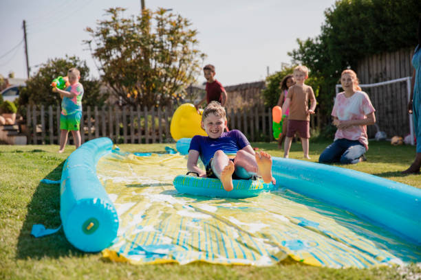istock My Turn on the Slip n Slide! 1334422250