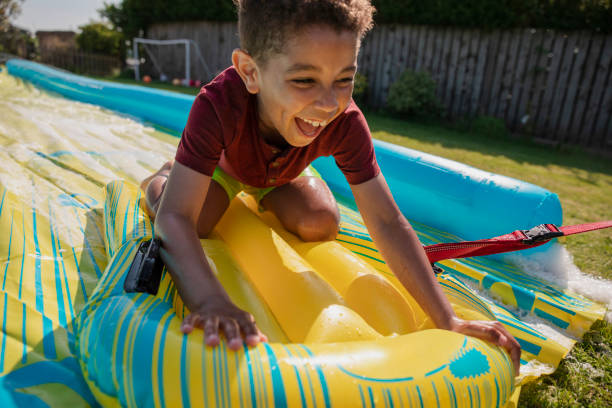 istock Having the Most Fun on the Slip n Slide 1334423705