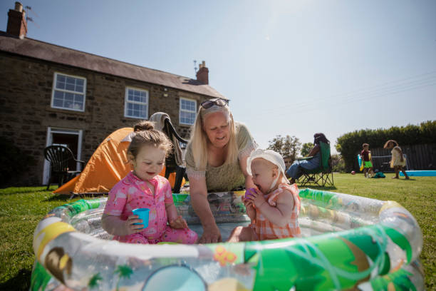 istock Having Fun in the Paddling Pool 1334424036