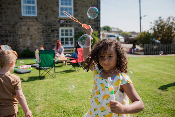 istock Blowing Bubbles in the Garden 1334425221