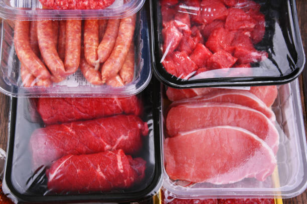 istock Composition with packages of assorted meat products 1334426824