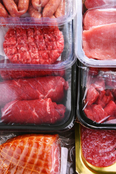 istock Composition with packages of assorted meat products 1334426844