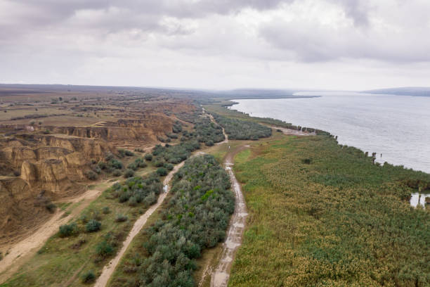 istock Landscape view of lake and shore 1334427277