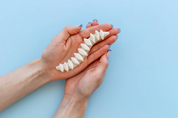 istock Human spinal column in hands. Spinal health and diseases concept 1334433075