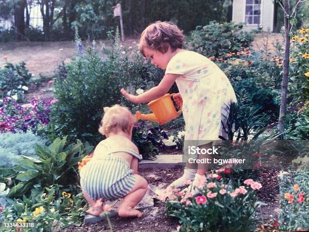 Big Sister Warning Little Brother 1988 In Garden Stock Photo - Download Image Now - Photography, Family, Old-fashioned
