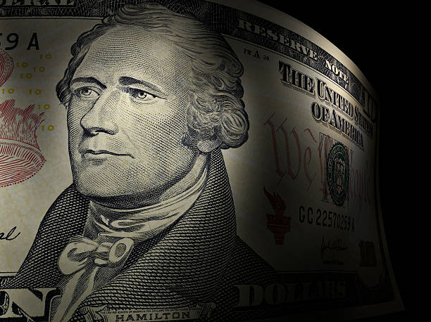 Alexander Hamilton's close up in a ten dollar bill Ten dollar bill with sharp focus and selective lights number 10 stock pictures, royalty-free photos & images