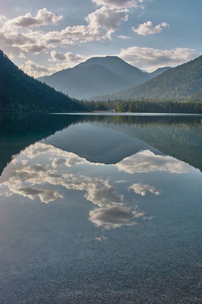 istock Mirroring mountain lake during sunrise. 1334434478