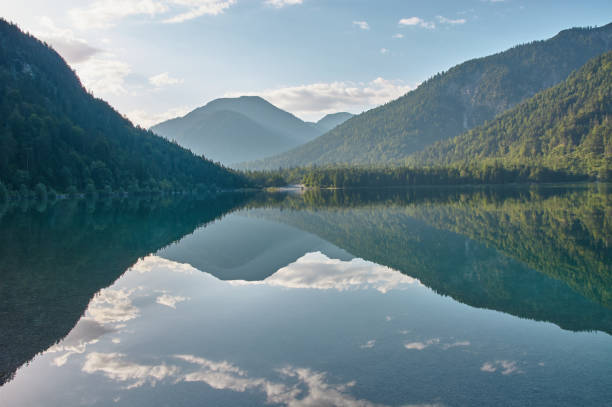 istock Mirroring mountain lake during sunrise. 1334434584