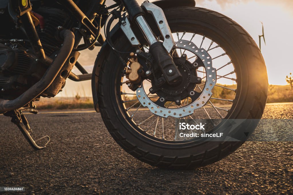 Motorcycle parked on the side of the road, motorcycle travel Motorcycle Stock Photo