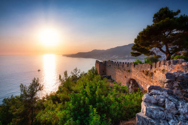 Beautiful walls on the hill in Alanya at sunset. Turkey
