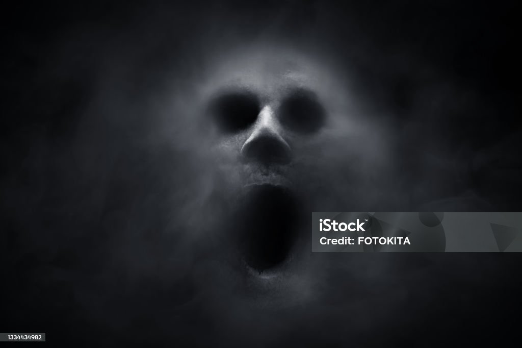 Scary ghost on dark background Horror Stock Photo