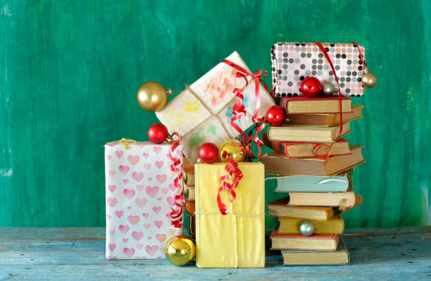 istock books as christmas gift,christmas present,reading,literature,education,making a gift concept 1334436021