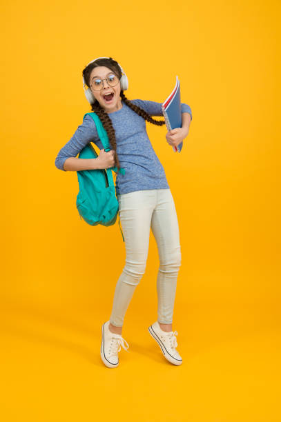 istock Ongoing lifelong education. Knowledge day. Influence concept. Feel the impact. Regular school day. Stylish schoolgirl. Girl carry backpack. Schoolgirl daily life. Inspired and motivated schoolgirl 1334441080