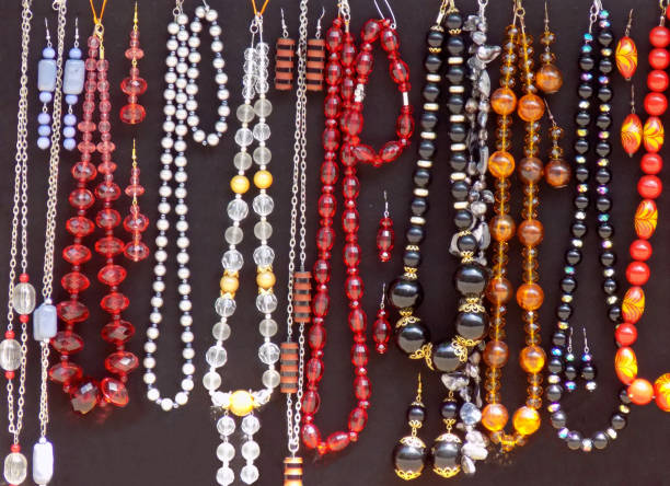 istock Colorful glittering jewelry on a black background 1334443794