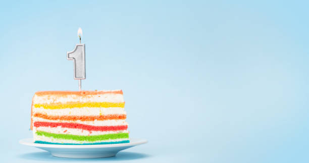 istock Birthday cake with number one candle 1334444784