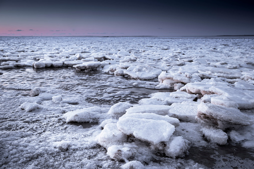 Ice floes in the wadden sea at dusk, Schillig, Wangerland, Friesland - District, Lower Saxony, Germany, Europe
