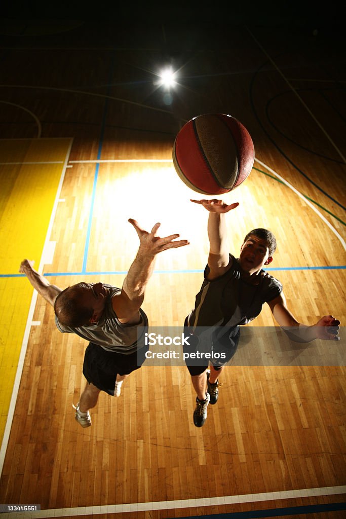 Basketball fight - dark silhouettes Basketball jump - dark silhouettes Basketball - Ball Stock Photo
