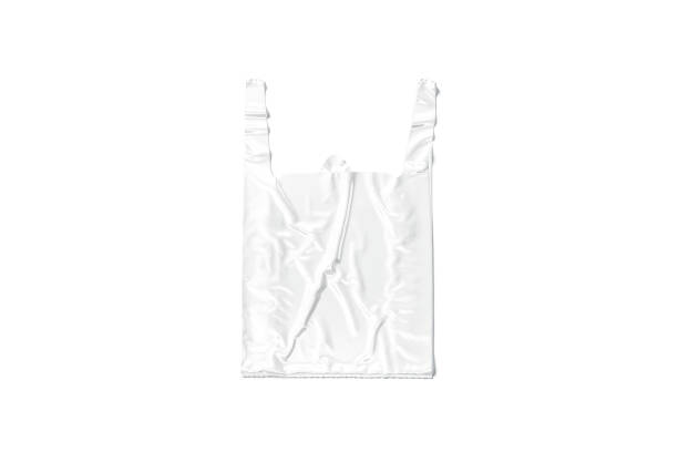 istock Blank white t-shirt plastic bag with handle mockup, top view 1334457298