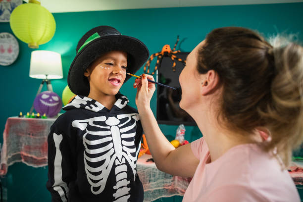 istock Painting My Sons Face For Halloween 1334461753
