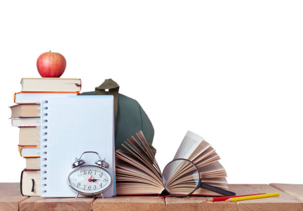 istock Education background with isolated books, white notebook, school bag on the white background 1334467471