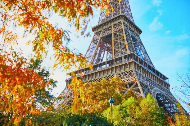 Scenic view of the Eiffel tower and Champ de Mars park on a fall day stock photo
