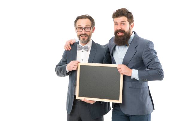 Day meeting. formal businessmen, copy space. welcome on board. partners celebrate start up business isolated on white. announcement. party invitation. bearded men hold advertisement blackboard. reunión de día. hombres de negocios formales, espacio de copia. bienvenidos a bordo. los socios celebran la puesta en marcha de negocios aislados sobre blanco. anuncio. invitación a la fiesta. hombres barbudos sostienen pizarra publicitaria