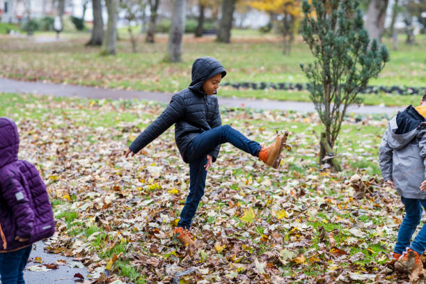 istock Kids Enjoying Autumn 1334470872