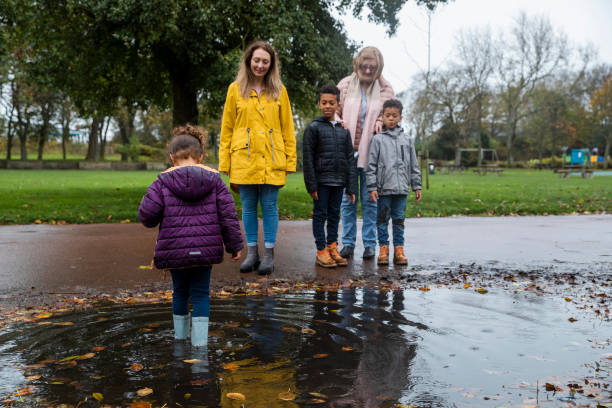 istock Little Girl in a Puddle 1334471226
