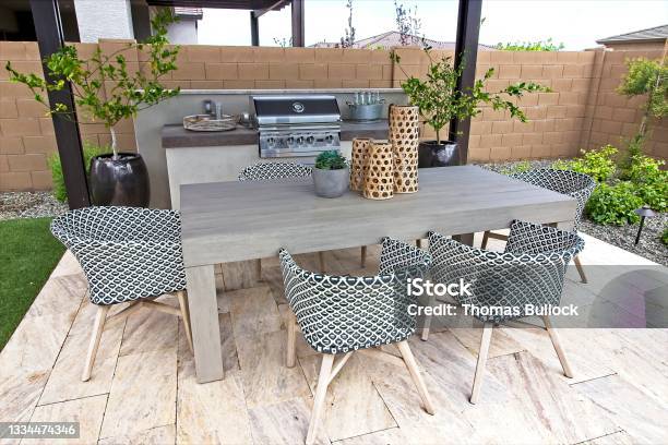 Back Yard Bbq Area With Table And Chairs Stock Photo - Download Image Now - Patio, Back Yard, Lifestyles