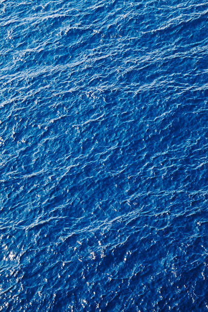 istock View on blue sunlit sea at summer. Natural background. 1334475395
