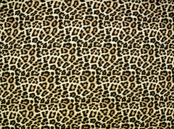 istock Cotton fabric with leopard animal print 1334477008